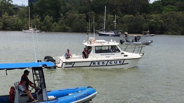 Volunteer marine rescue boats help in search for missing man in Brisbane River.