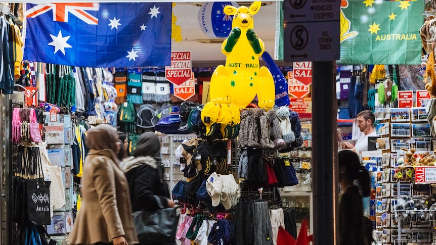 An inflatable boxing kangaroo and Australian flags and hats are on sale at a shop in Swanston Street in Melbourne.