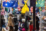 An inflatable boxing kangaroo and Australian flags and hats are on sale at a shop in Swanston Street in Melbourne.