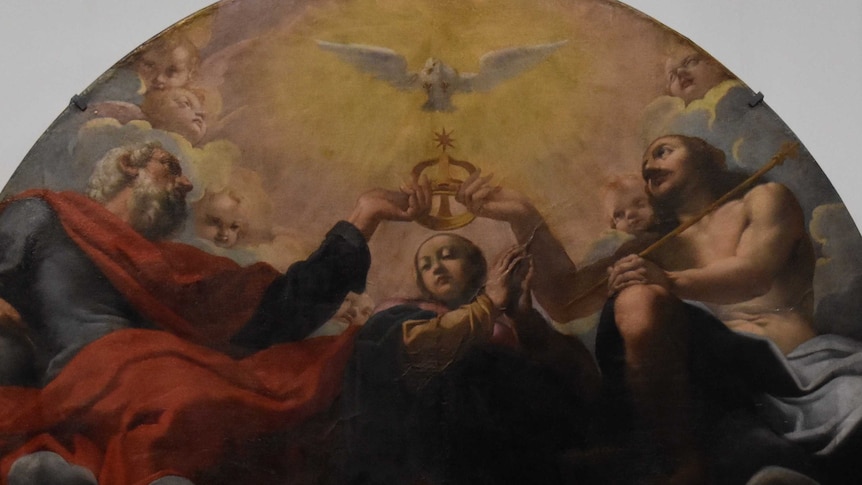 A painting showing a dove, crown and three people