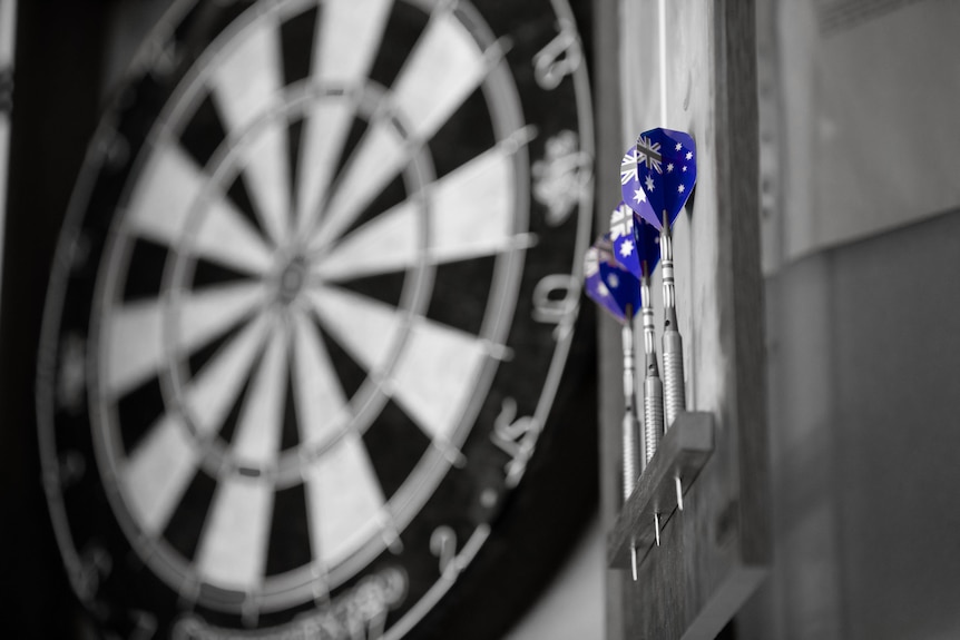 Close up of darts with Australian flag on them