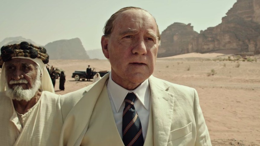 Actor Kevin Spacey is pictured in a white suit in a scene from 2017 movie All the Money in the World.