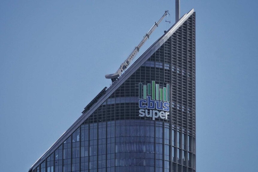 A tower has a sign at the top which says CBUS Super.