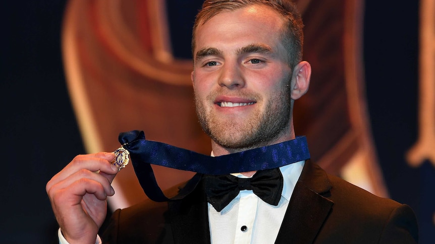 Tom Mitchell with the Brownlow Medal