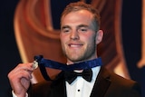 Tom Mitchell with the Brownlow Medal