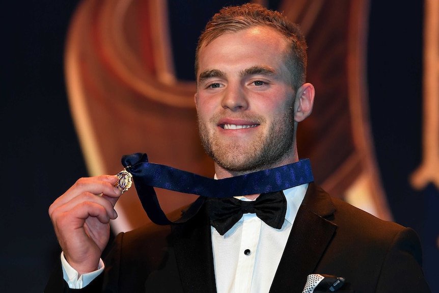 Tom Mitchell with the Brownlow Medal