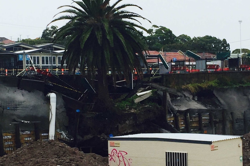 Part of a bowling green at Merewether Bowling Club has fallen away.