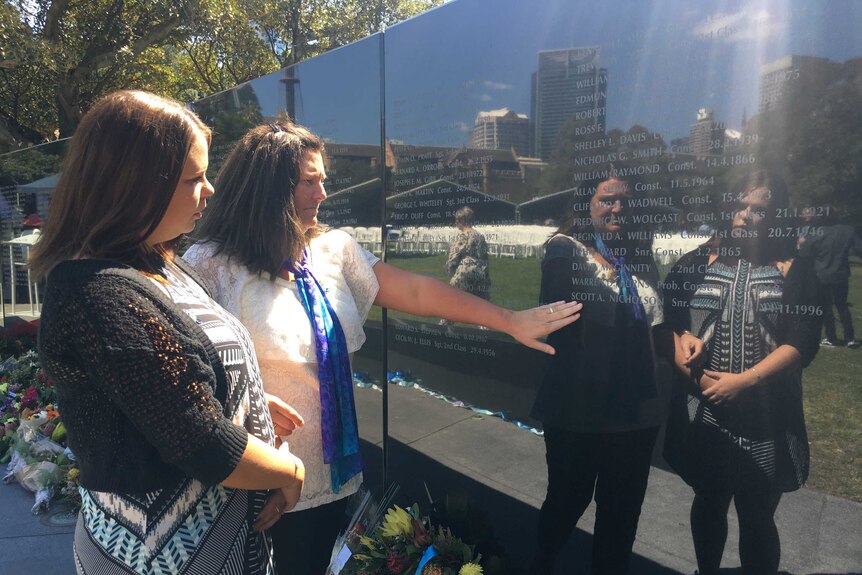 The wife of late Senior Constable Scott Nicholson, Sharon Nicholson-Rogers, standing at the NSW Police Wall of Remembrance