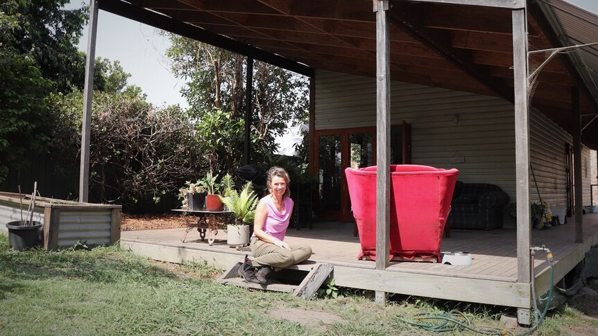 Emma Hohnen, pictured outside the second house she built on her property in NSW.