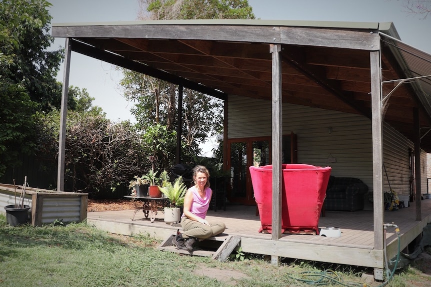 Emma Hohnen, pictured outside the second house she built on her property in NSW.