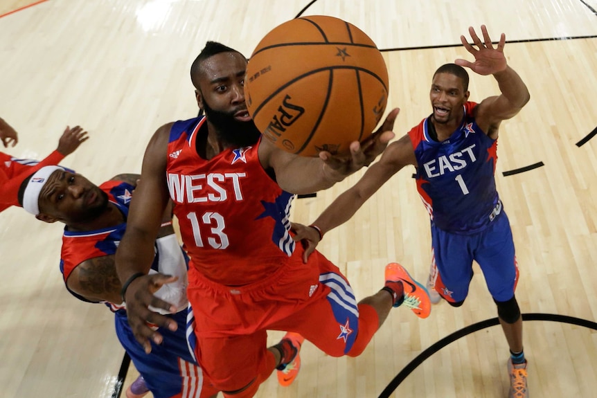 The West's James Harden goes for a basket in the NBA All-Star game