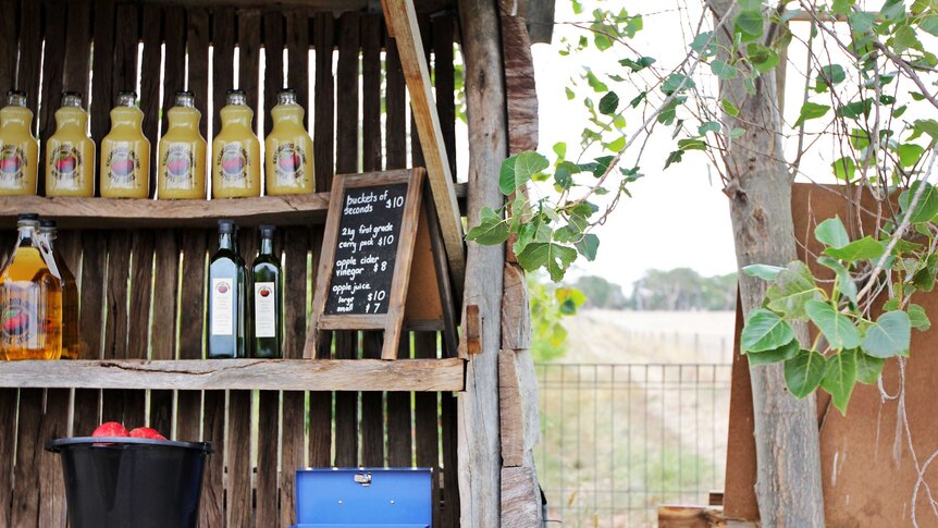 A display of apples, juice and apple cider vinegar is set up at Kalangadoo Organic Orchard.