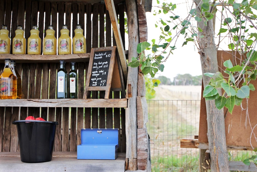 A display of apples, juice and apple cider vinegar is set up at Kalangadoo Organic Orchard.
