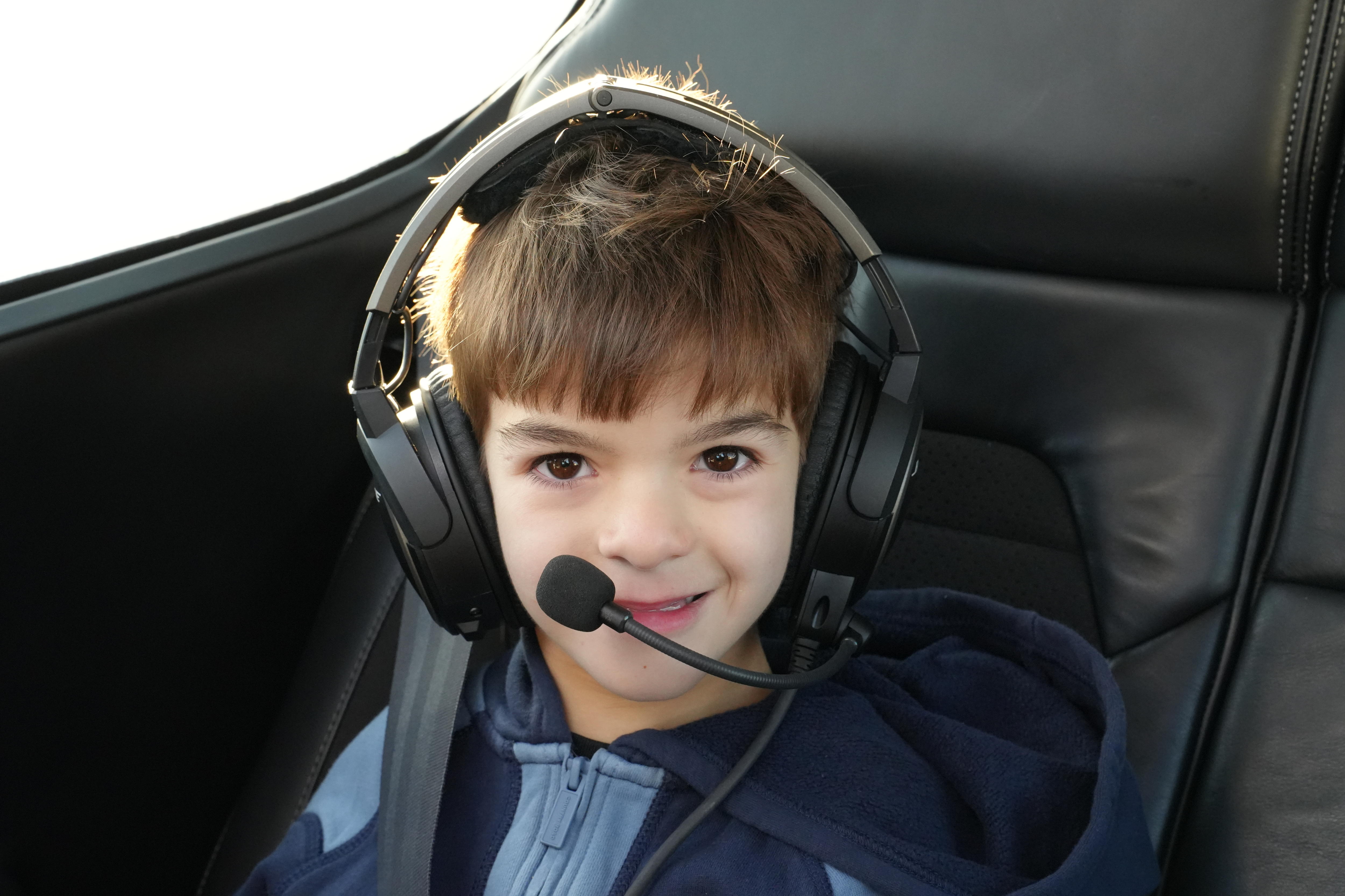 a kid in a headset 