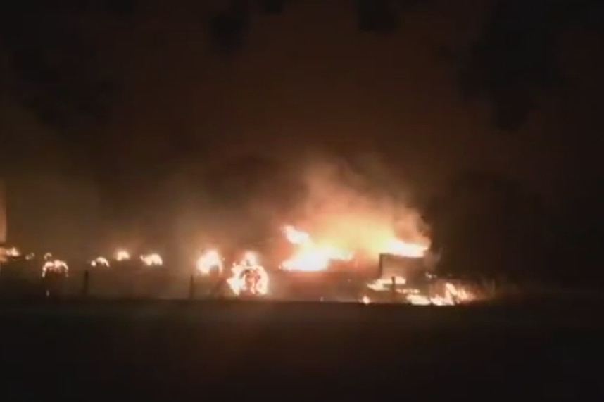 Night image of fires burning near Terang Victoria.