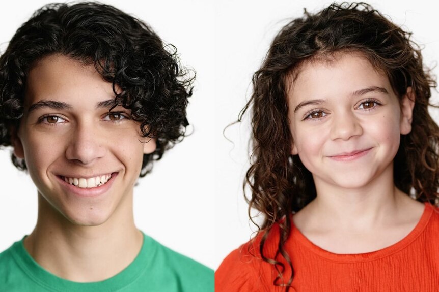 Two children, one boy with brown hair in green shirt and girl with long brown hair in red shirt