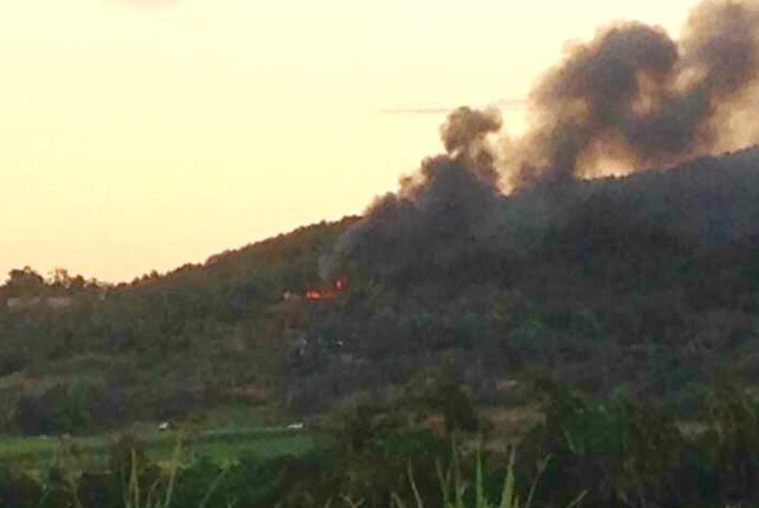 A house on fire where a man is feared dead after an explosion heard by neighbours at Farleigh