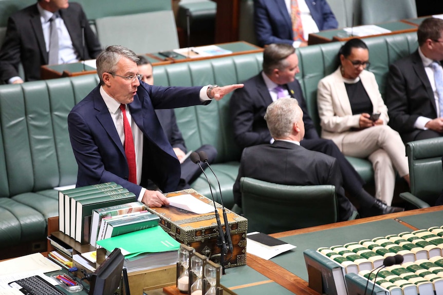 Mr Dreyfus is gesturing across the despatch box at the government benches.