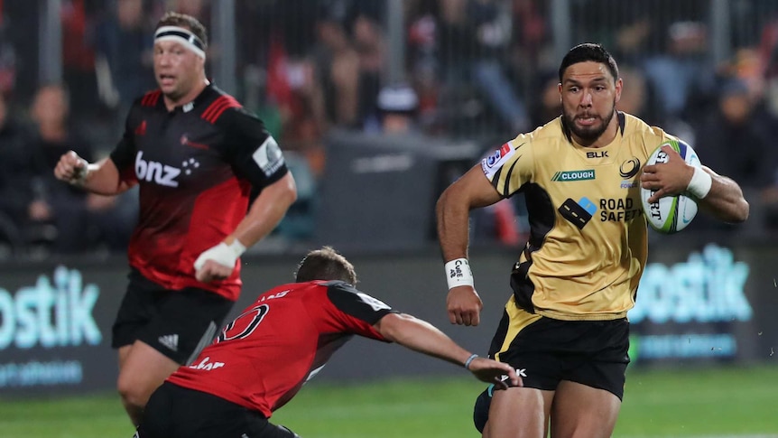 Curtis Rona running for the Western Force with ball in hand against Crusaders.