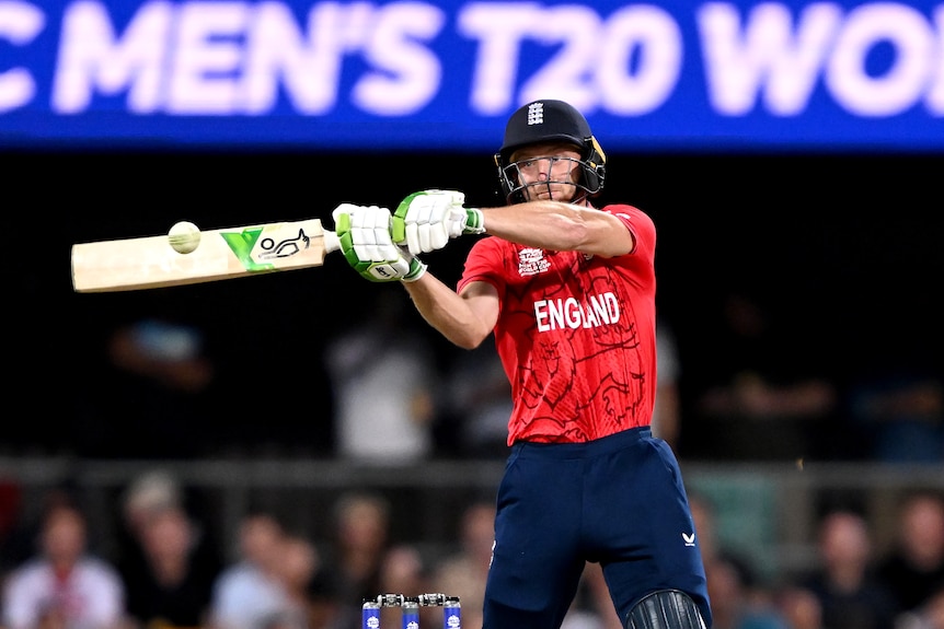 Jos Buttler hits a shot with a bat parallel to the ground