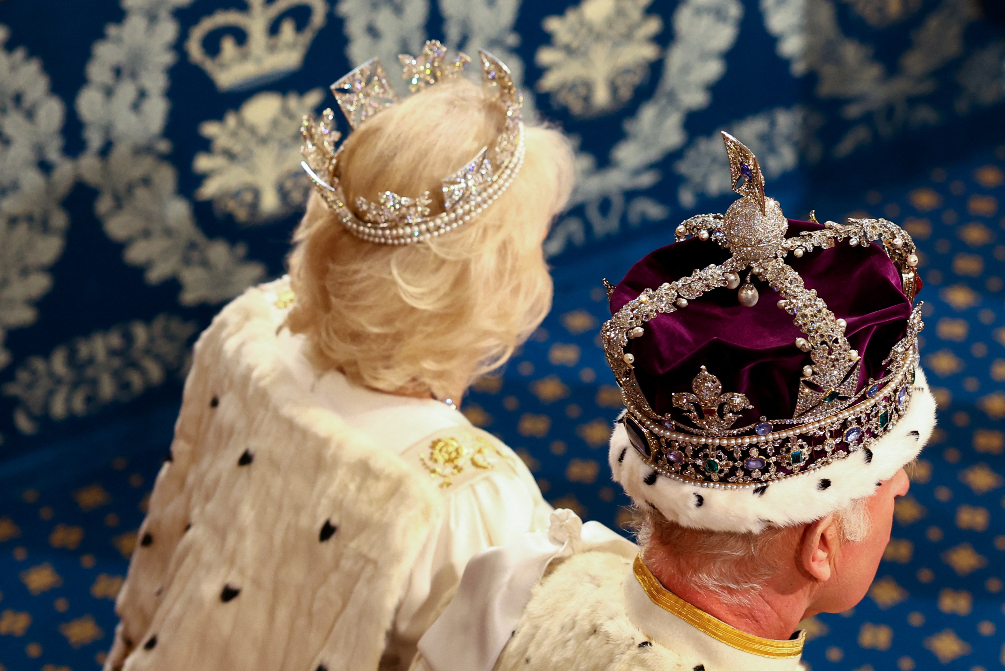 A photo taken from over the top of the King and Queen showing off their crowns
