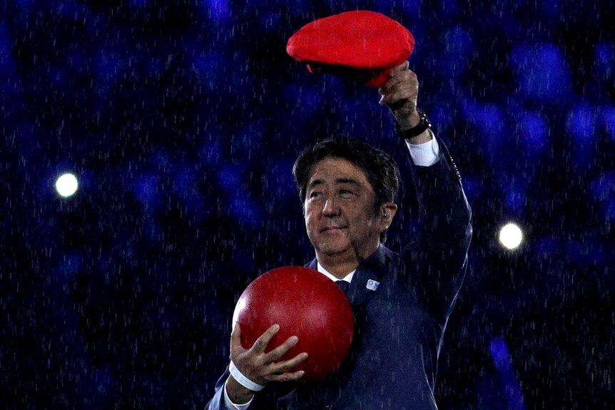 Shinzo Abe appears at the Rio Olympics closing ceremony dressed as Mario