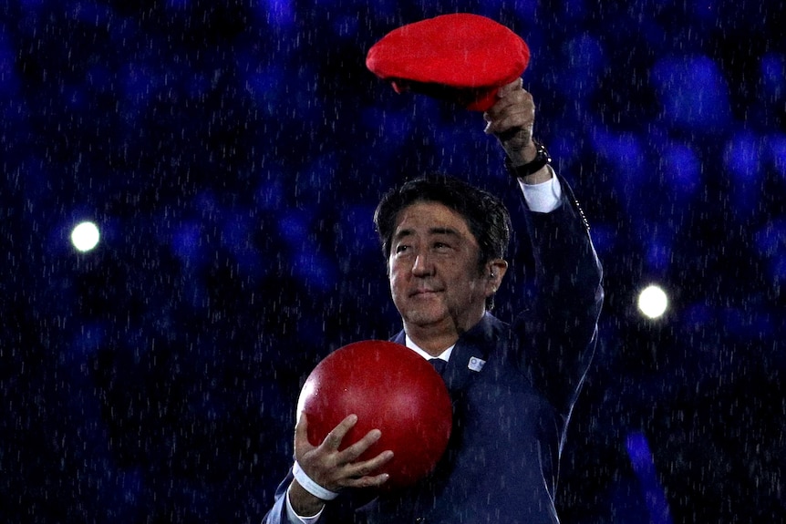 Shinzo Abe appears at the Rio Olympics closing ceremony dressed as Mario