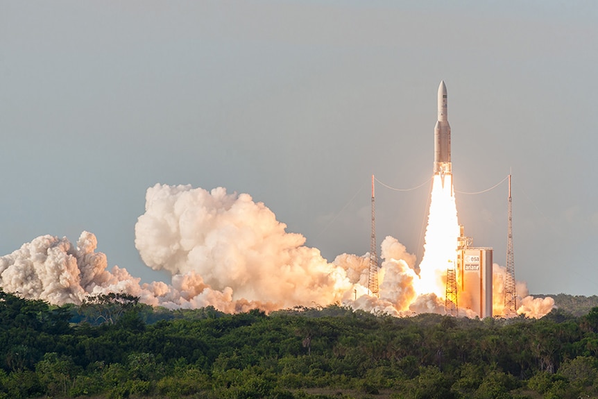 Rocket lifts off from launchpad.