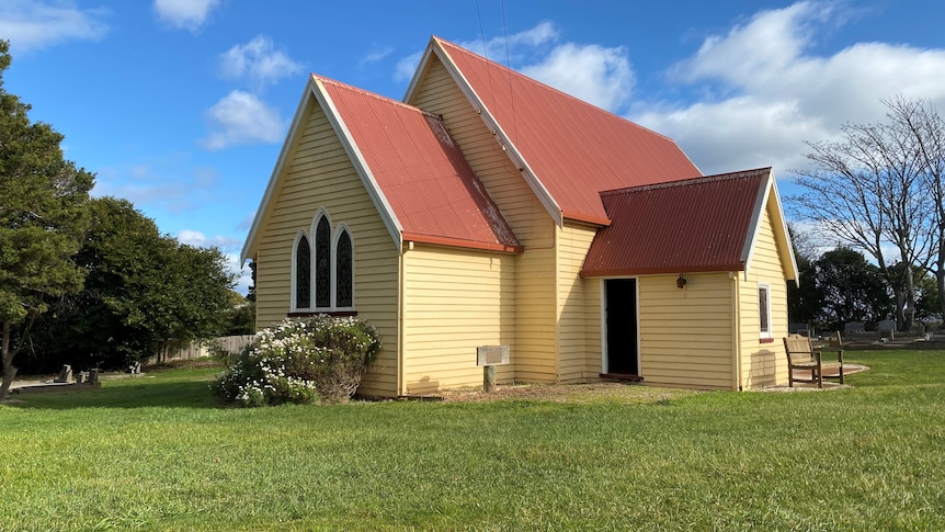 A bright tellow country church.