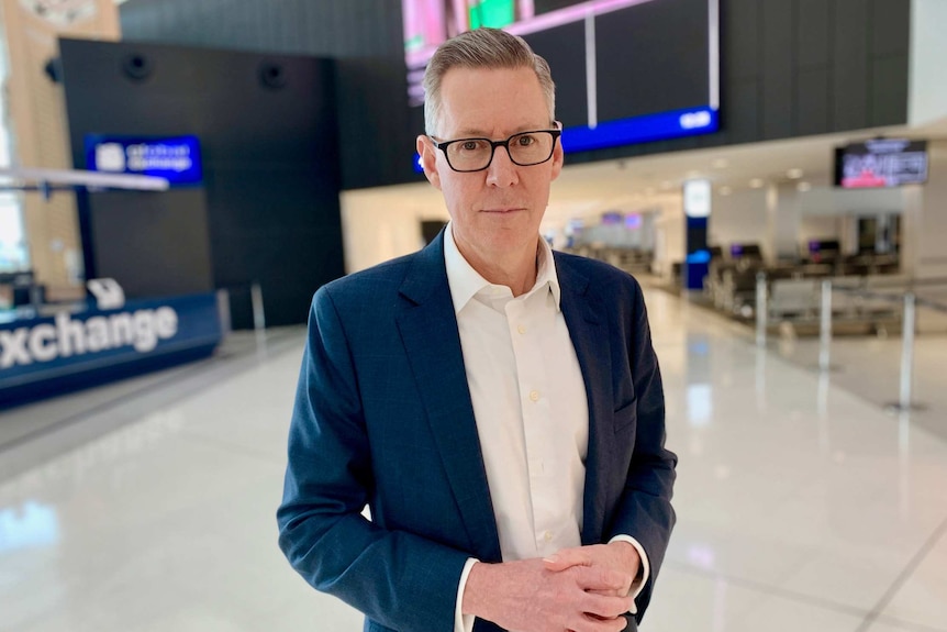 Portrait photo of Geoff Culbert CEO of Sydney airport.