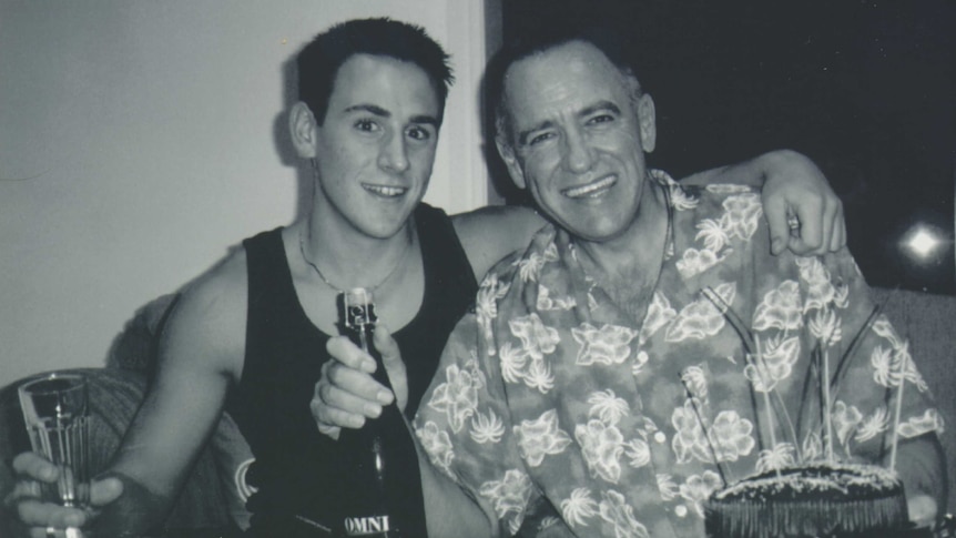 Bali bombing victim Billy Hardy and his father Bill celebrate together.