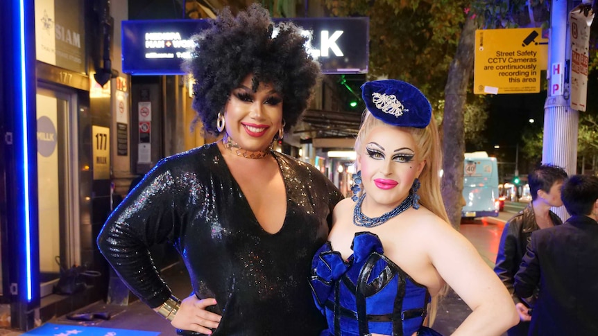 Two drag queens celebrate the end of lockout laws on Oxford Street, Sydney.