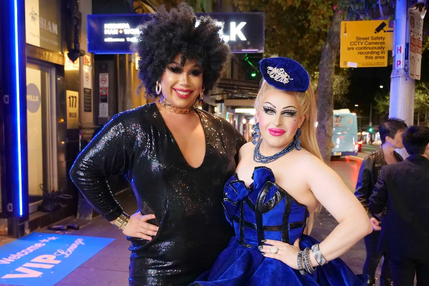 Two drag queens celebrate the end of lockout laws on Oxford Street, Sydney.