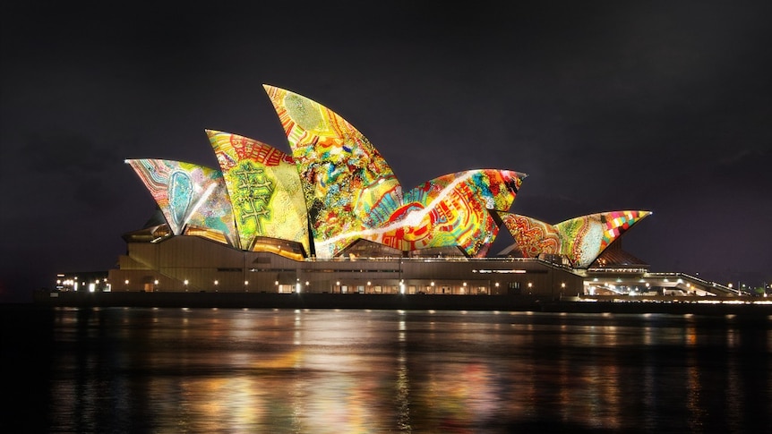 The Sydney Opera House sails lit up with artwork from the Yarrkalpa - Hunting Ground digital artwork