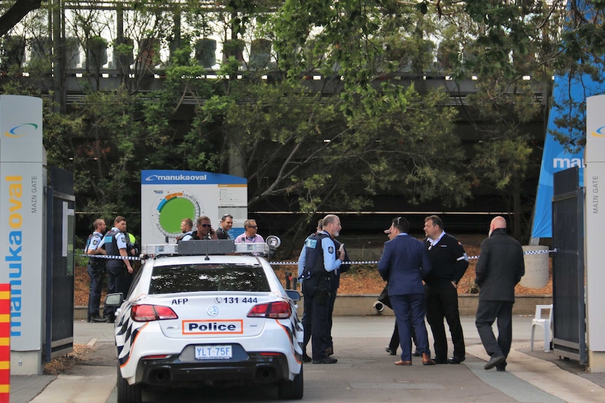 A police car at the gates of Manuka Oval in Canberra.