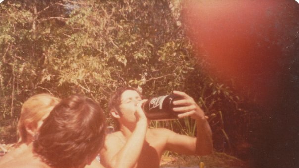 Dated photograph, circa 1971, young boy drinking Darwin Stubby.