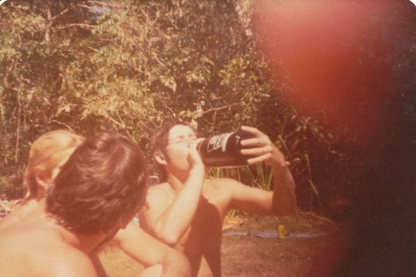 Dated photograph, circa 1971, young boy drinking Darwin Stubby.