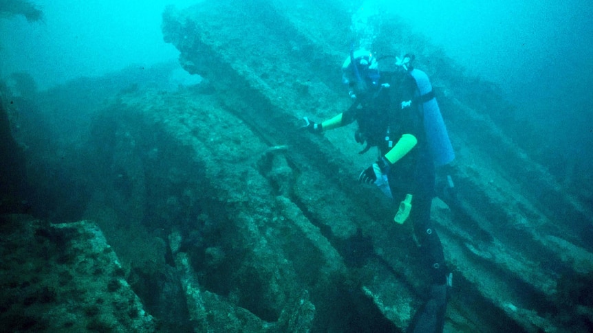 Diver at the wreck of SS Clan Ranald