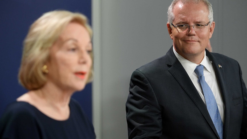 Scott Morrison smiles at Ita Buttrose