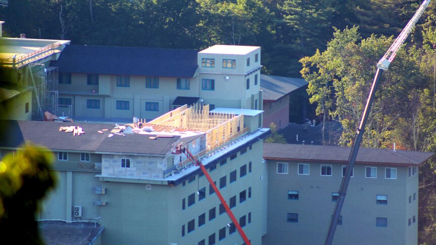 A roof being build at Dragon Springs.