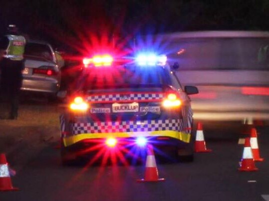 NT Police car with flashing lights