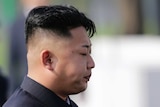 Kim Jong-un reacts as he arrives for the opening ceremony of the Cemetery of Fallen Fighters of the Korean People's Army in Pyongyang.