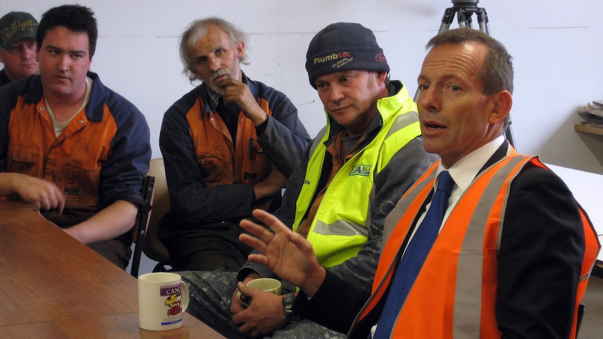 Opposition Leader Tony Abbott talks to engineering workers about the carbon tax.
