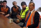 Opposition Leader Tony Abbott talks to engineering workers about the carbon tax.