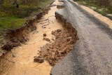 A road in serious disrepair after flooding