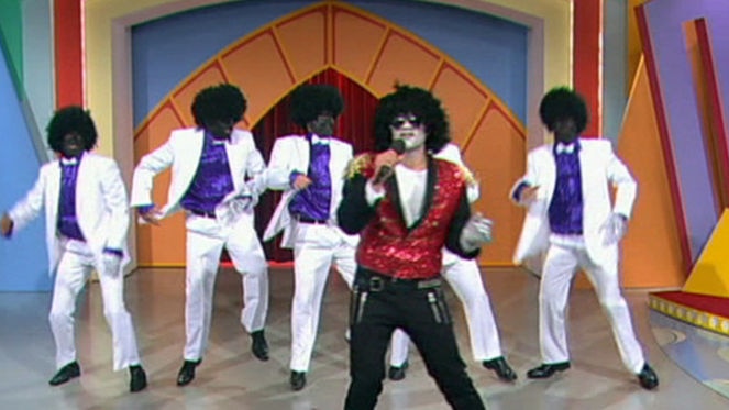 A 'blackface' tribute to Michael Jackson on Hey Hey causes controversy.