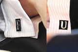 A composite image combining photographs of the two cufflinks worn by Jarrod Bleijie which read F and U.