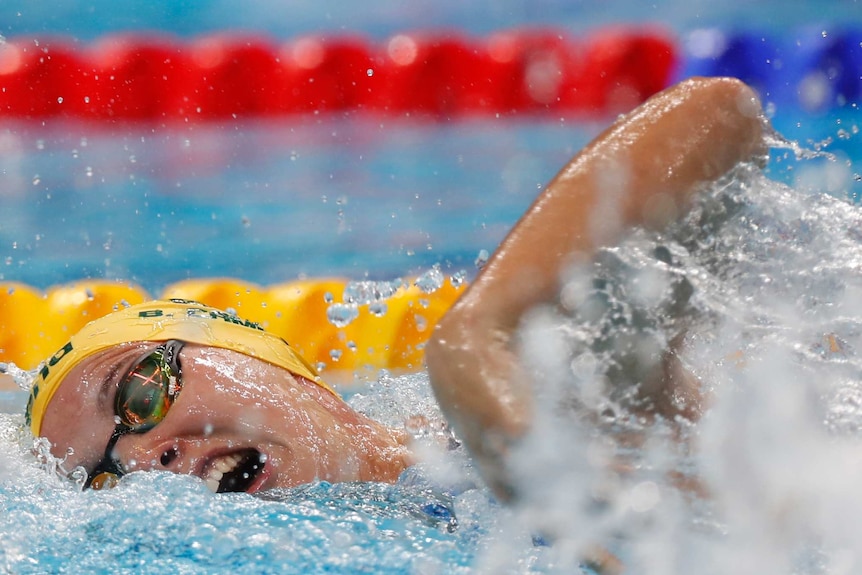 Bronte Campbell takes a breath mid-stroke on her left side at world championships.