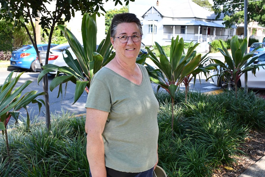 Verge gardiner Gayle Dallaston standing by a verge.