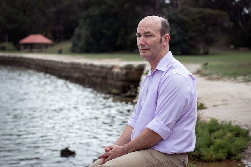 A man next to a river